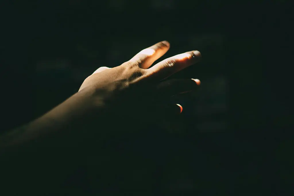 hands in light